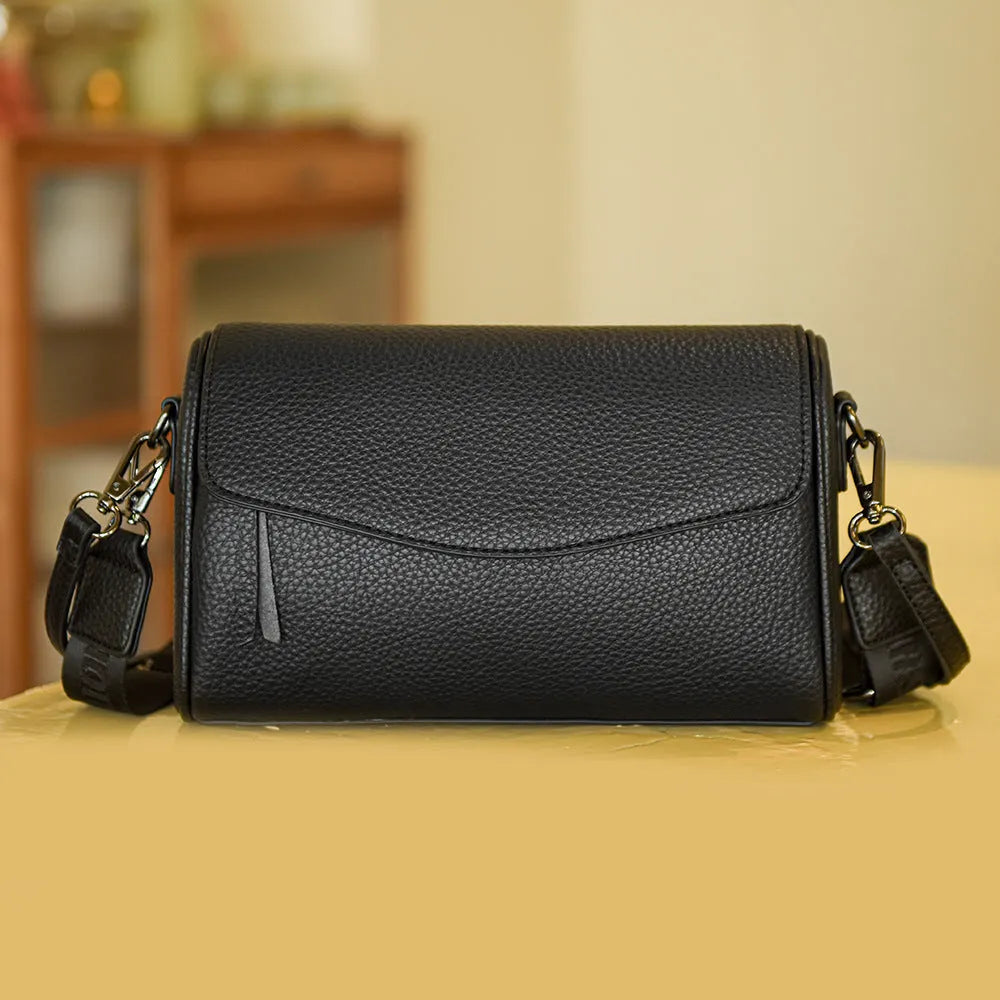 Casual women's genuine leather shoulder messenger bag in black with double strap and lining