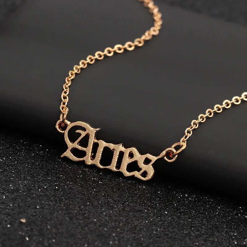 Collier Zodiac Old English alloy pendant necklace with engraved astrology sign symbol