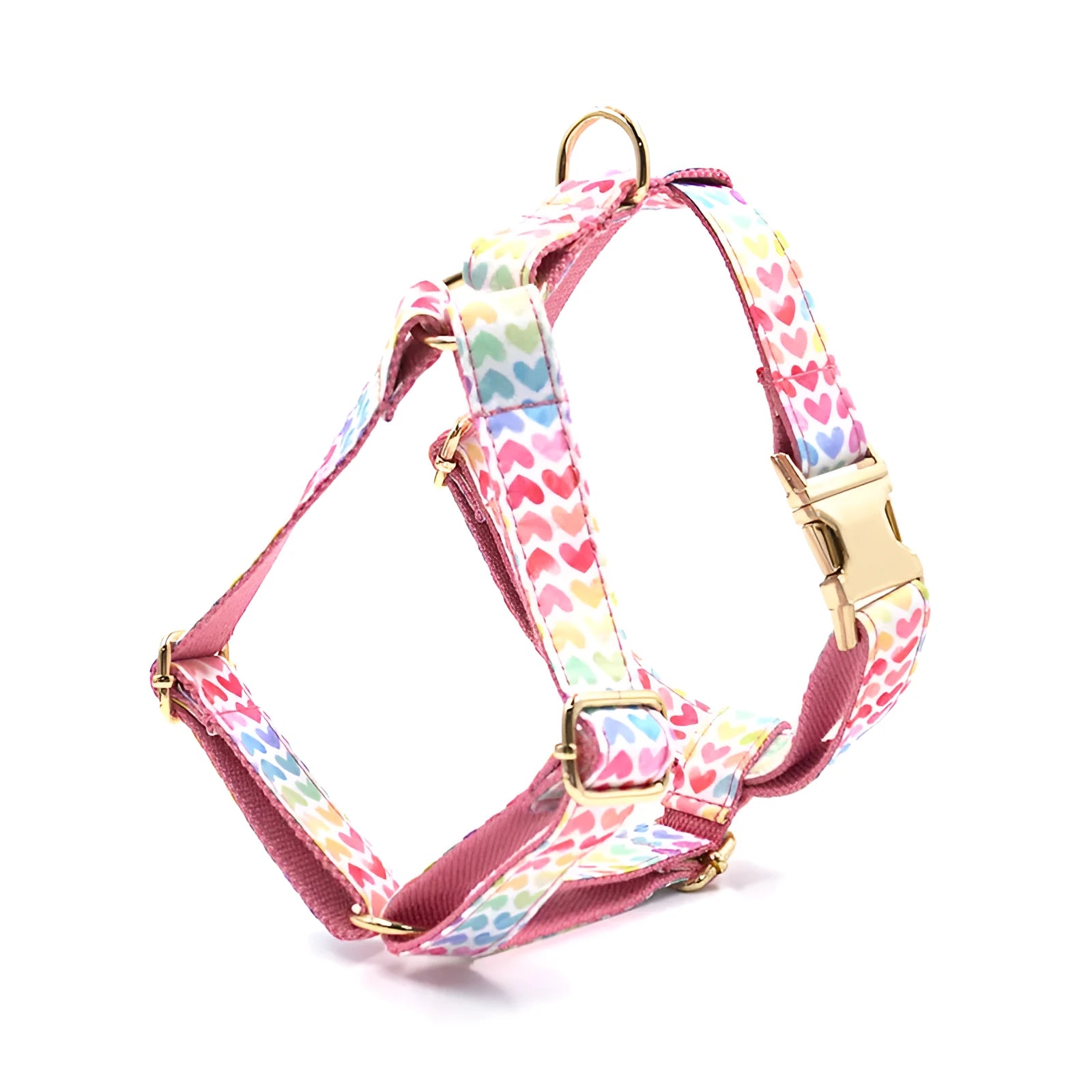 Pink dog harness with gold buckle and colourful heart-shaped stone decoration in four sizes
