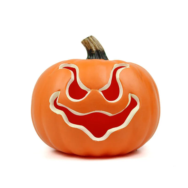 Orange plastic pumpkin-shaped atmosphere light on a dark surface, 23 cm size
