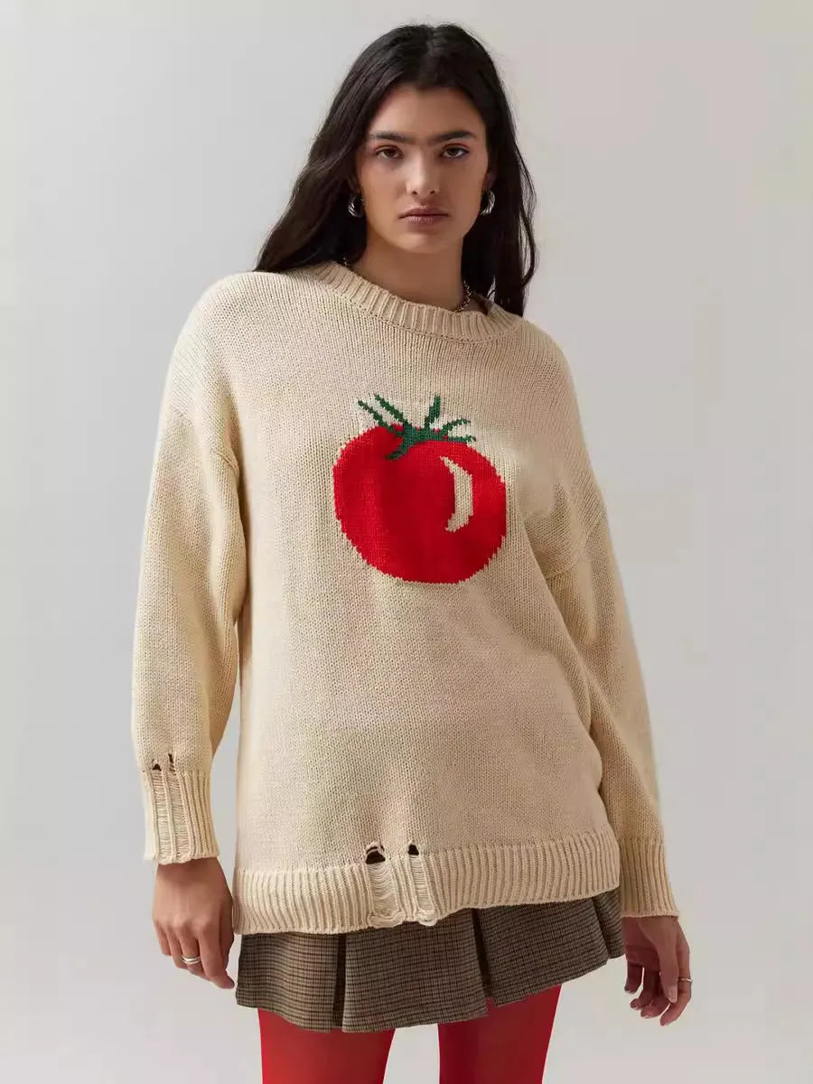 Women's loose-fitting milky white acrylic sweater with jacquard pattern and round neck.