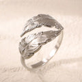 Adjustable stainless steel feather ring showing electroplated finish in silver or gold colour option
