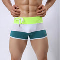 Fearless Captain men's swimming pants in black, white, and grey colourway, flat corners design, brief style