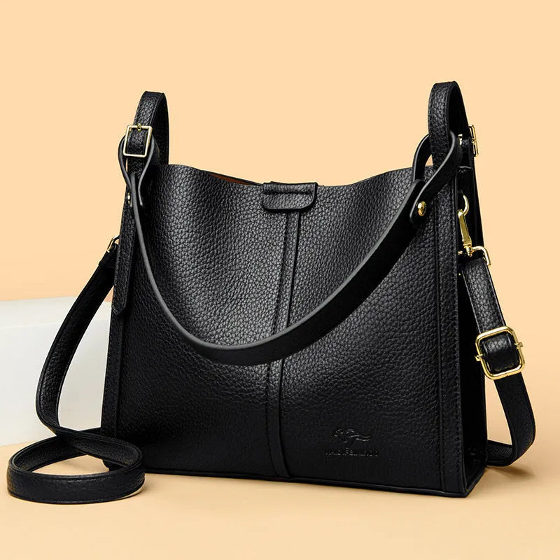 Retro-style ladies shoulder bag in soft PU material with internal organisers and single strap