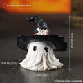 Resin Halloween wizard hat ornament in black or purple colour.