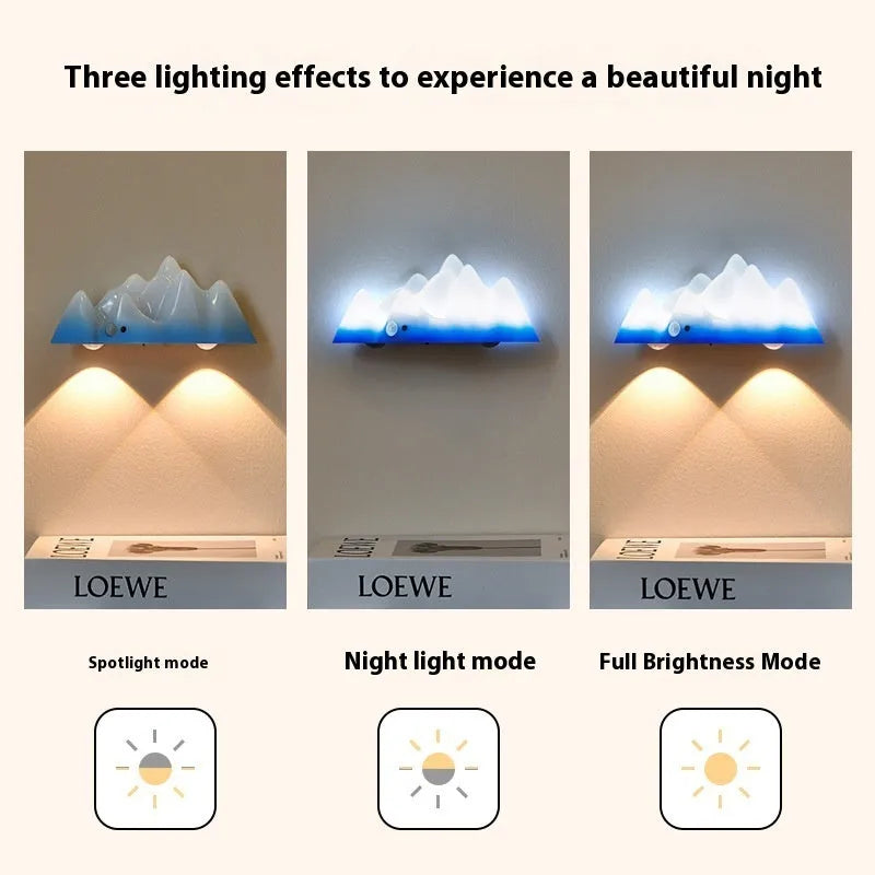 Snow Mountain sensor chargeable night lamp with remote control in modern simplicity style on a bedside table