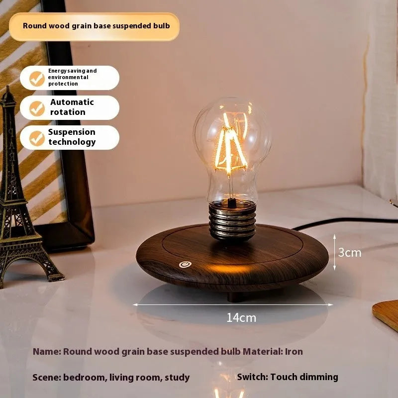 Creative small desktop night lamp with a suspension bulb and iron art body on a wood grain base.