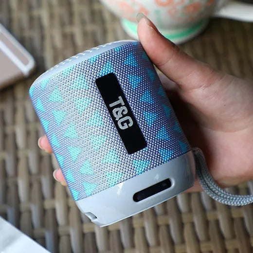 Portable wireless Bluetooth speaker in black measuring 73.4mm with USB charging