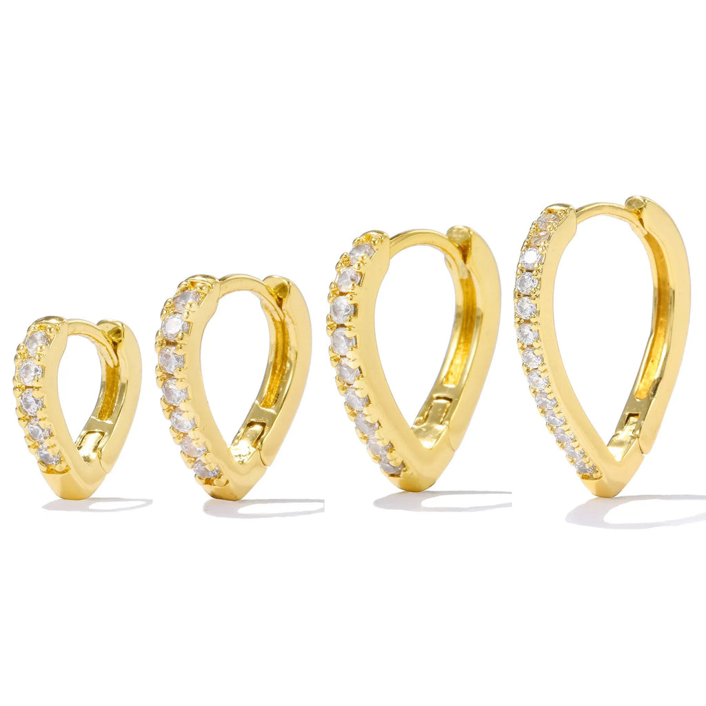 Geometrical heart-shaped gold and white gold electroplated copper ear clip for women.