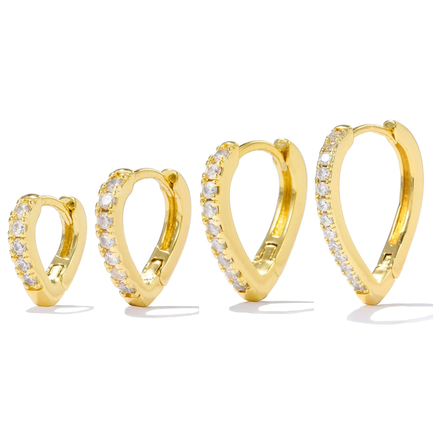 Geometrical heart-shaped gold and white gold electroplated copper ear clip for women.