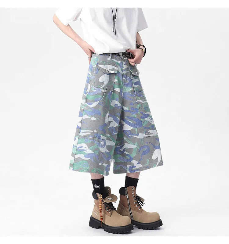 Camouflage pattern cotton cropped workwear trousers with straight leg and pockets on a mannequin