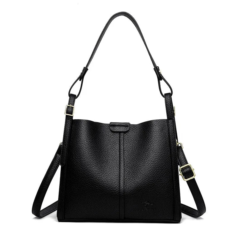 Retro-style ladies shoulder bag in soft PU material with internal organisers and single strap