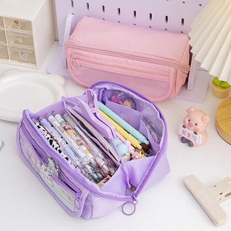 Open ten-layer flip canvas pencil case in multiple colours showing internal compartments.