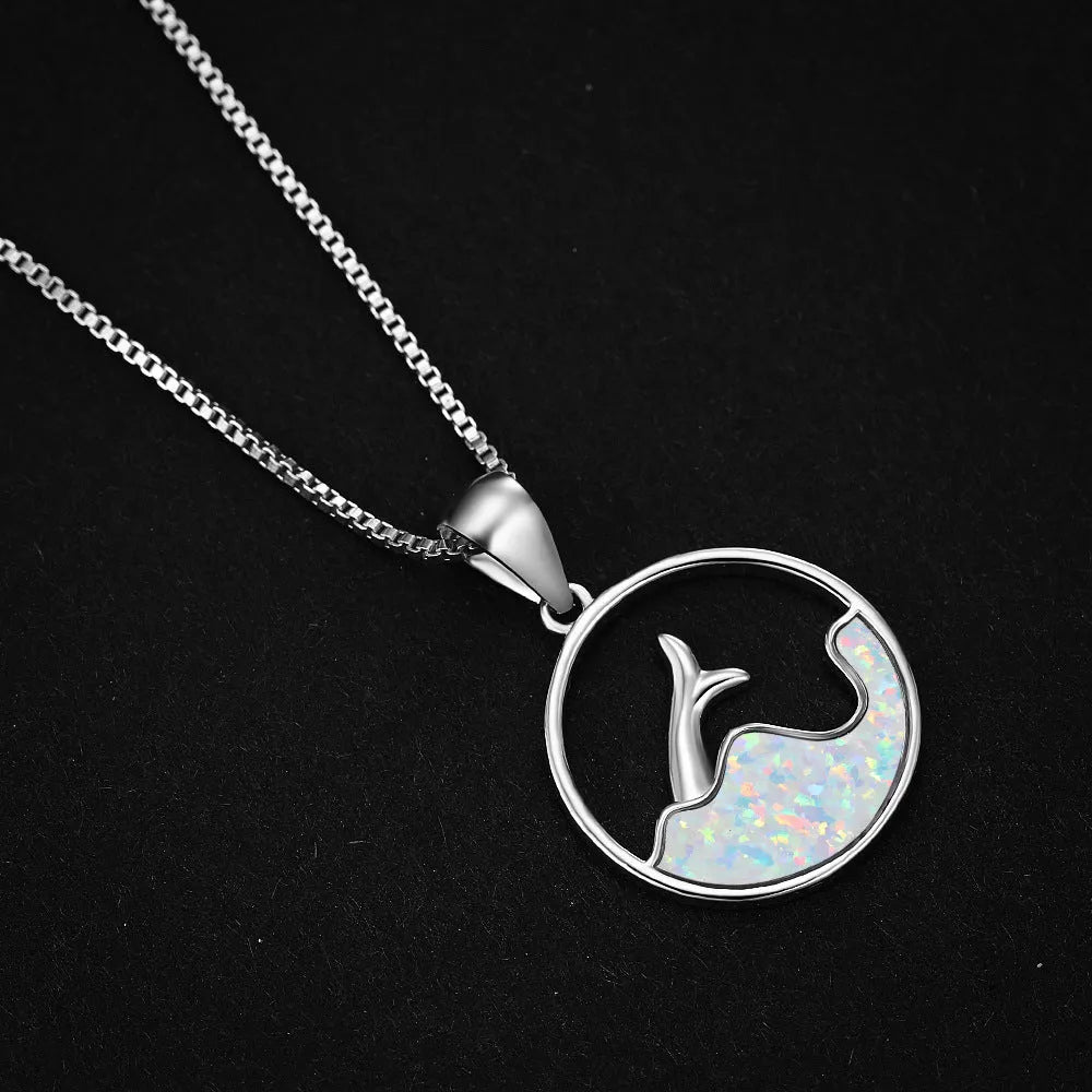 Geometric sea fishtail copper necklace with electroplated blue opal stone and round design element