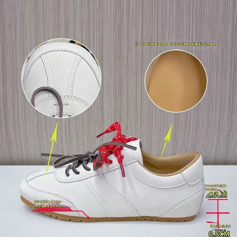 White women's lace-up casual sneakers with horse fur flocking texture, flat heel, and round toe.