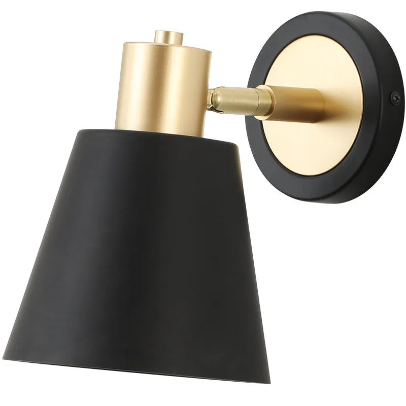 Nordic style iron wall lamp with adjustable LED light on a plain wall.