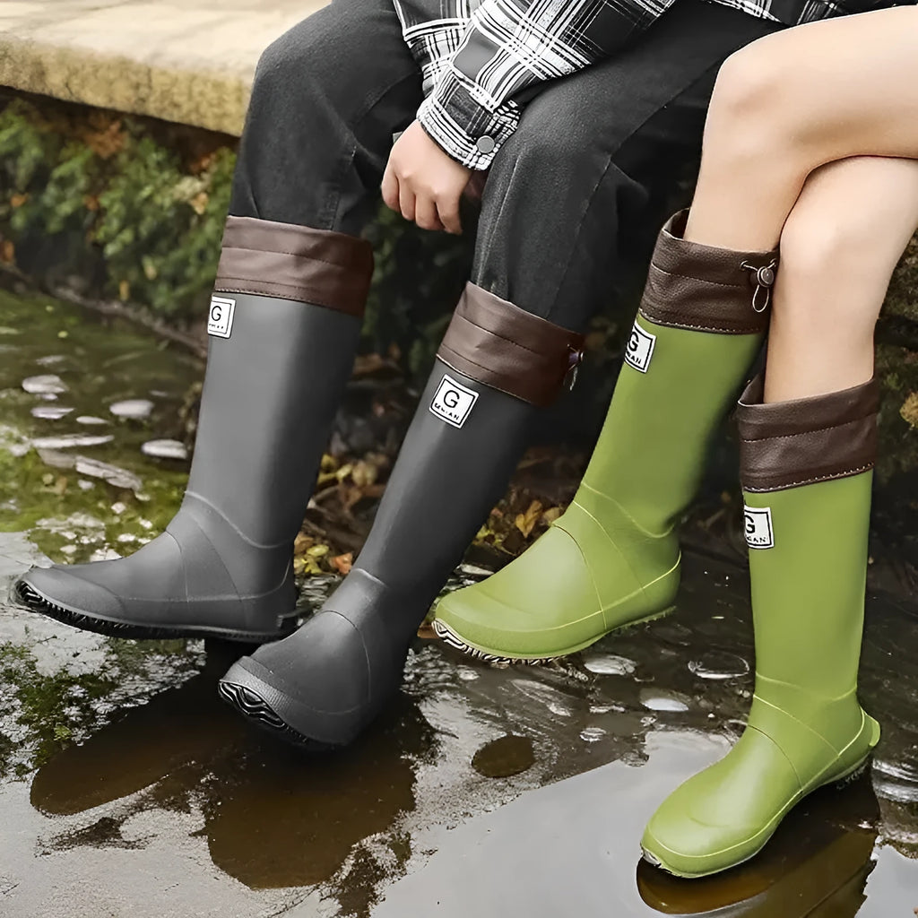 Pair of non-slip rain boots with plastic upper, leather stitching, flat heel and round toe, sizes 36-44