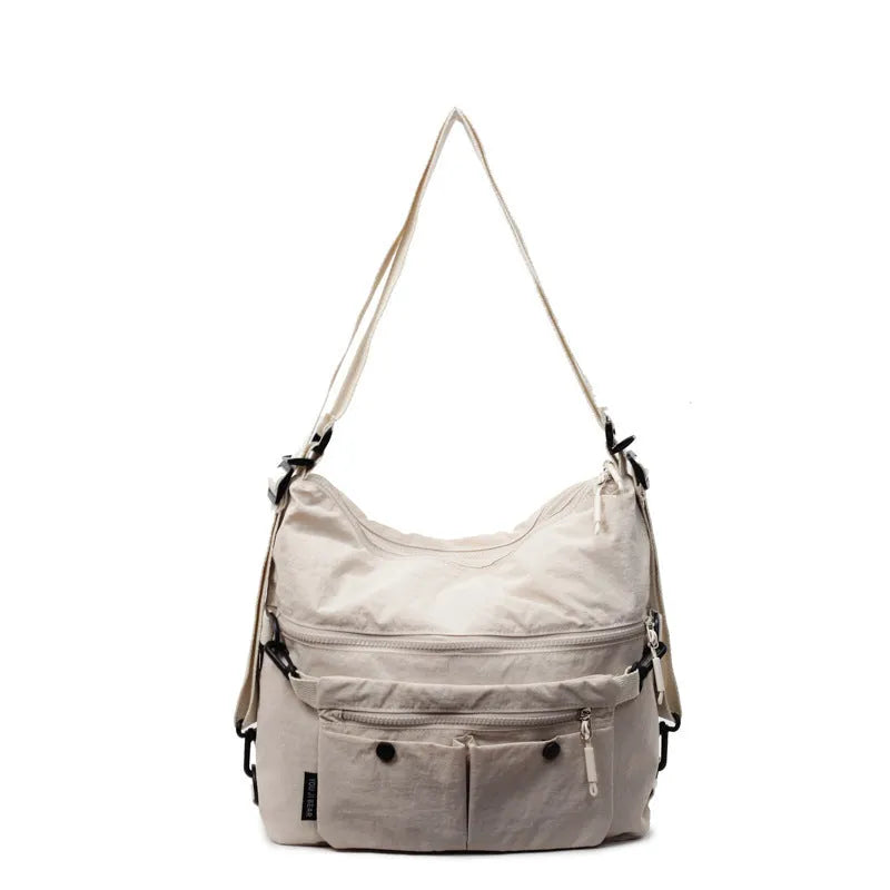 Women's soft nylon crossbody bag in square vertical shape with dual shoulder straps