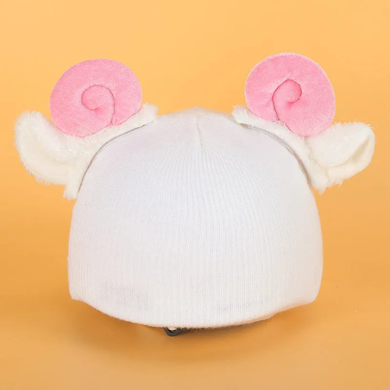 Cute cartoon ski helmet hat plush decoration in a selected colour style for winter theme display.