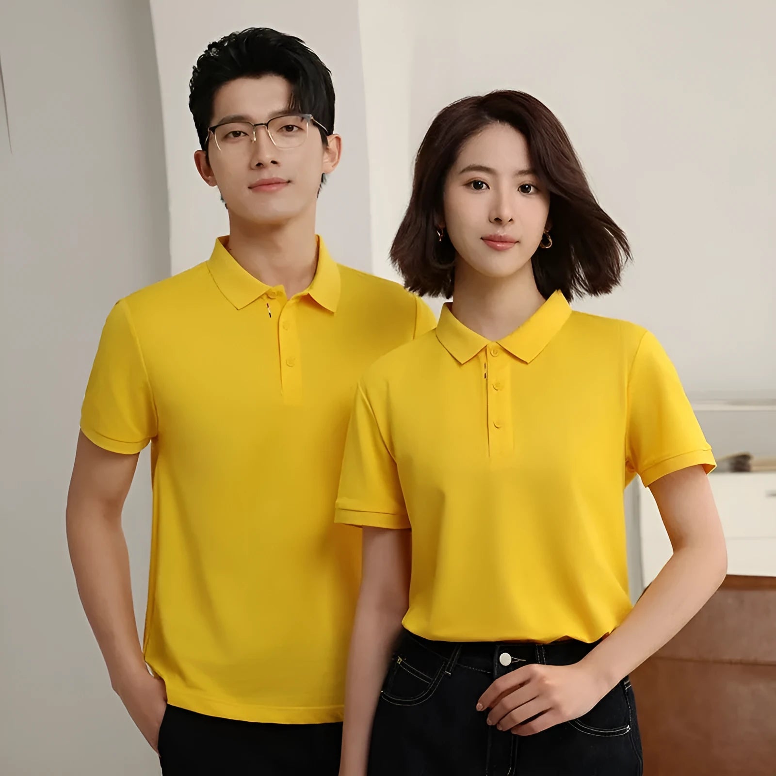Solid colour cotton blend catering polo shirt shown in multiple colours with short sleeves and regular fit