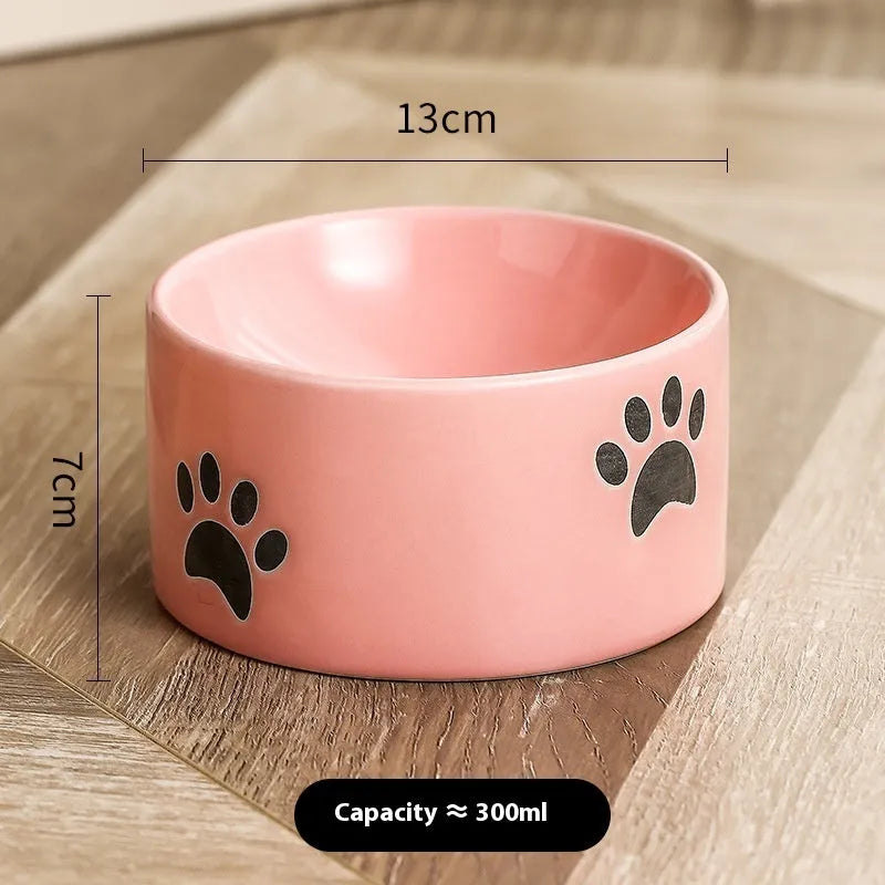 Ceramic cat bowl with high-footed design showing cat's paw decoration pattern in selected colour
