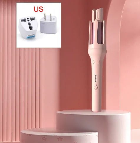 White and pink automatic hair curler with 32mm ceramic barrel and international power plugs on a table.
