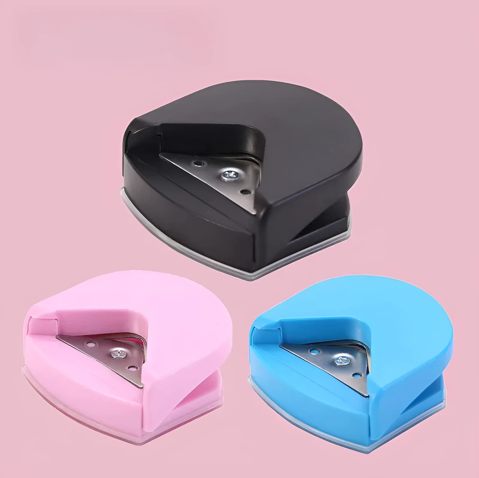 Black plastic and metal business card corner cutter for rounding photo edges.