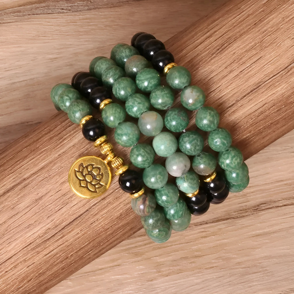 Green and black elastic beaded long bracelet with alloy construction