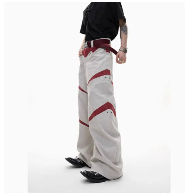 Heavy industry deconstruction overalls with contrast stitching and metal rivets, straight-leg high-waist trousers available in black or grey