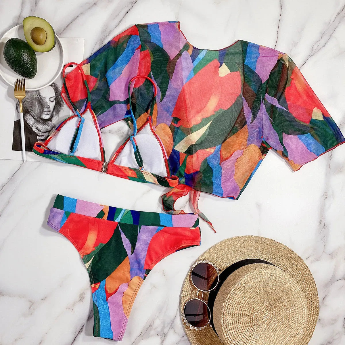 Red women's split-style swimsuit with a printed pattern, for swimming and surfing.