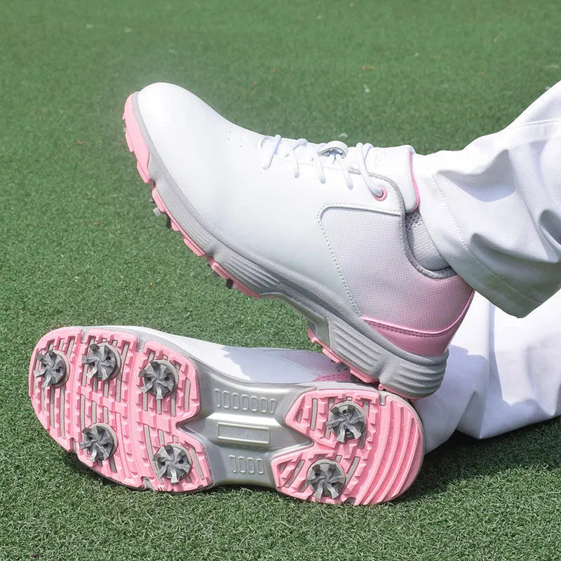 Women's waterproof golf sneakers with white or pink microfiber upper and natural rubber outsole