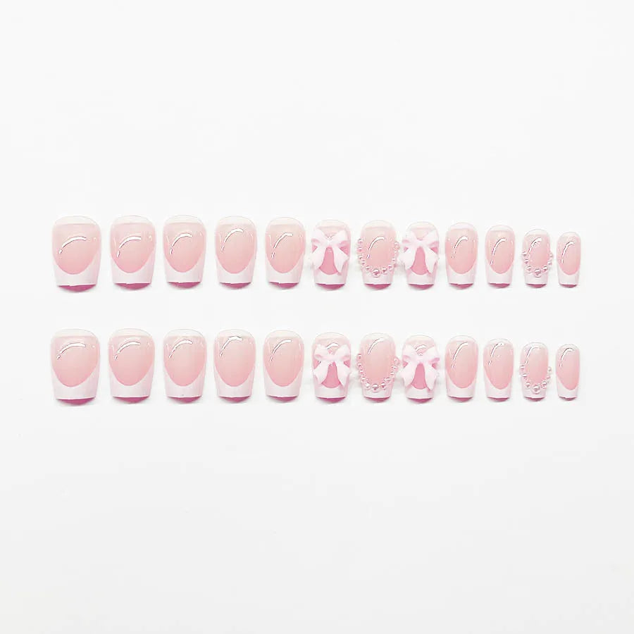 S274 French manicure gel strips with white tips, bow, and tulip designs for short square nails on a blush base.