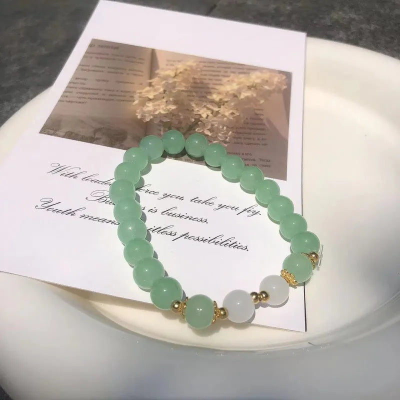 Chinese style glass bracelet with bamboo joint design elements in multiple colour options