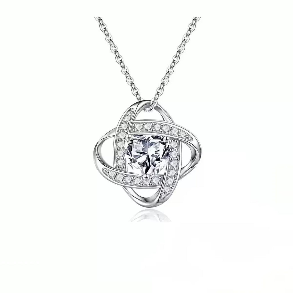 A heart-shaped pendant necklace with a platinum-colour electroplated finish and a coloured crystal centre.