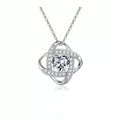 A heart-shaped pendant necklace with a platinum-colour electroplated finish and a coloured crystal centre.