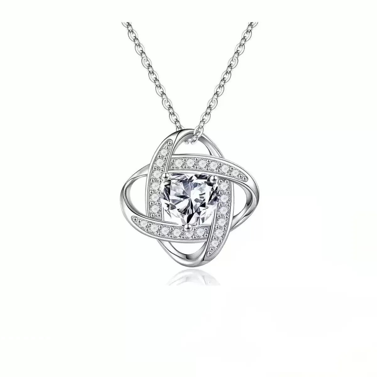 A heart-shaped pendant necklace with a platinum-colour electroplated finish and a coloured crystal centre.