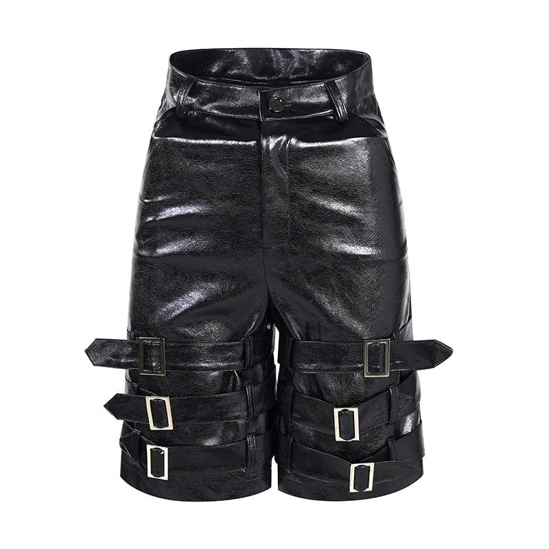 Man's black PU leather-look cropped shorts with stretch spandex material on a neutral background.