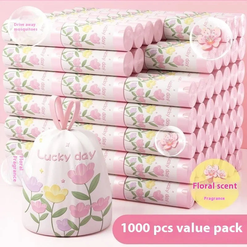 Pink degradable drawstring garbage bags with argy wormwood mosquito repellent, shown in a pack.