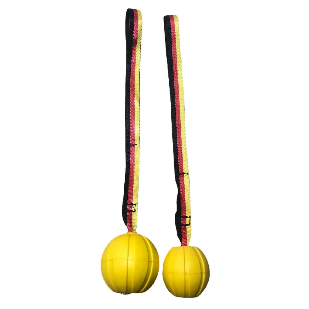 Yellow and camouflage coloured EVA floating dog ball with string in three different sizes on blue background