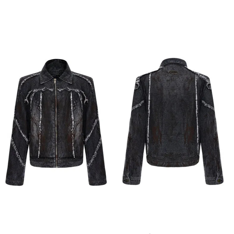 Black denim coat with padded shoulders and matching pants, featuring raw edge splash-dyeing and distressed gradient detailing.