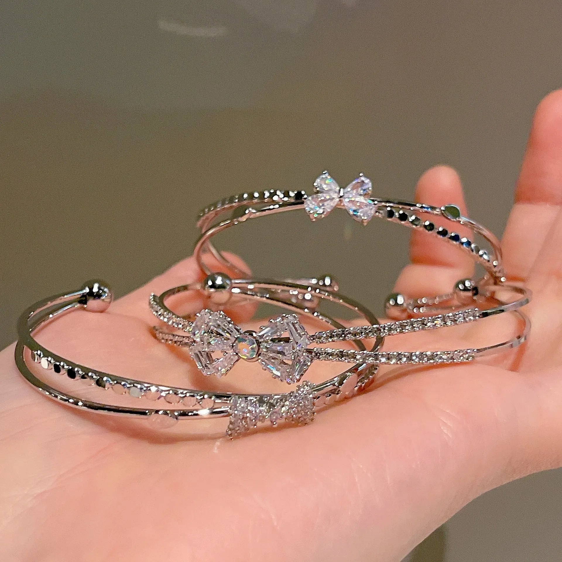 Women's silver electroplated copper bow bracelet with zircon stones minimal style