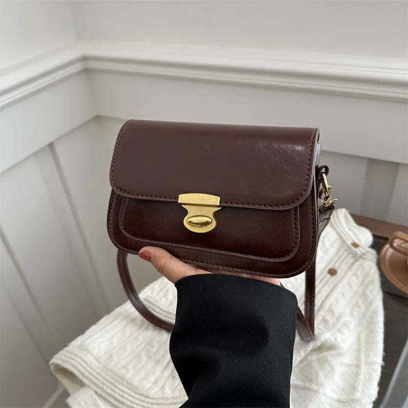 Retro square PU handbag in soft textured leather showing horizontal orientation and neutral colour options