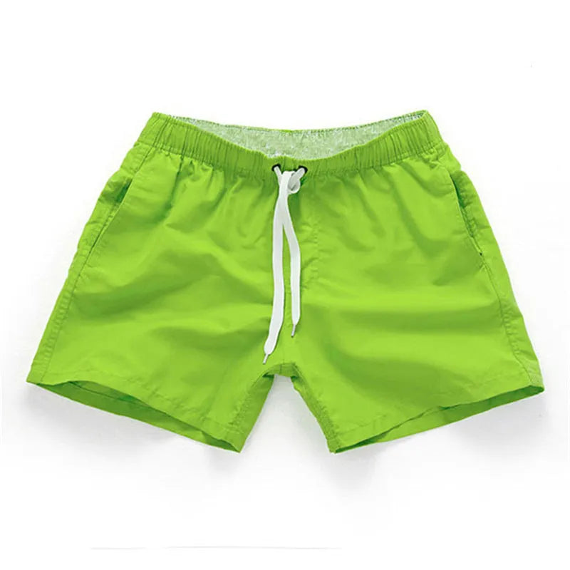 Men's straight leg beach shorts in polyester fabric available in multiple colours and sizes