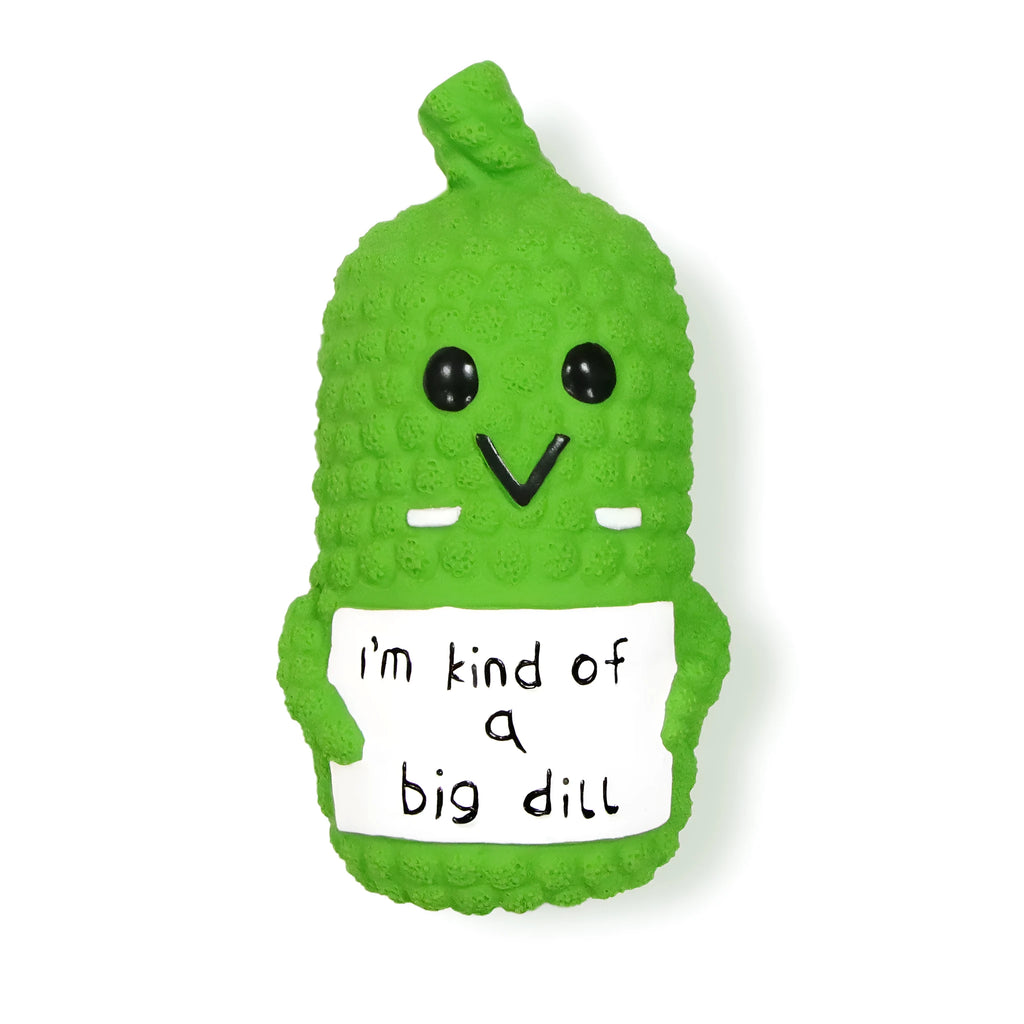 Green pickle-shaped squeaky dog chew toy with textured nubs on natural latex surface.