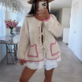 Women's beige loose knitted cardigan with contrast colour, front lace-up fastening and pocket, sizes S to XL