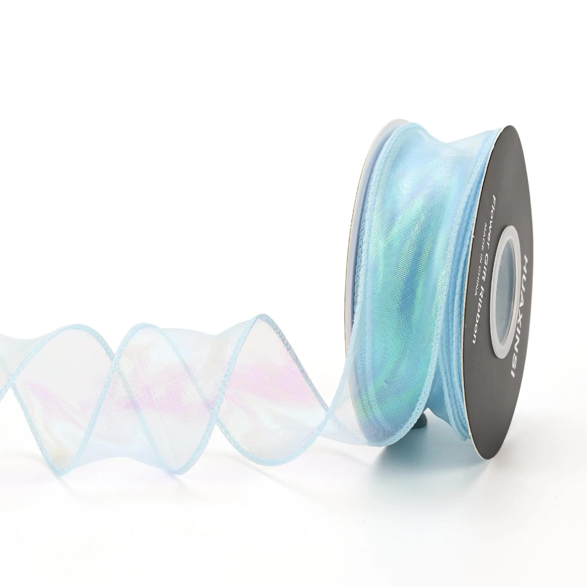 Roll of colourful fishtail yarn wave ribbon in mesh material, showing its textured, wave-like design.