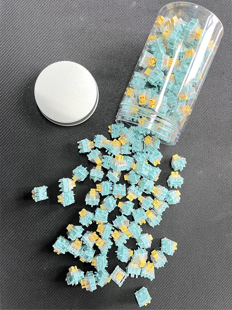 Pack of 36 Tiger Mo Sea Salt Lemon PRO Mute coloured mechanical keyboard switches.
