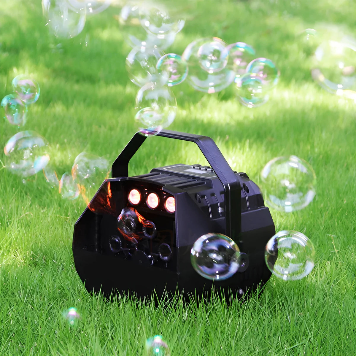 Mini plastic bubble machine with LED lights and US power cord on a table