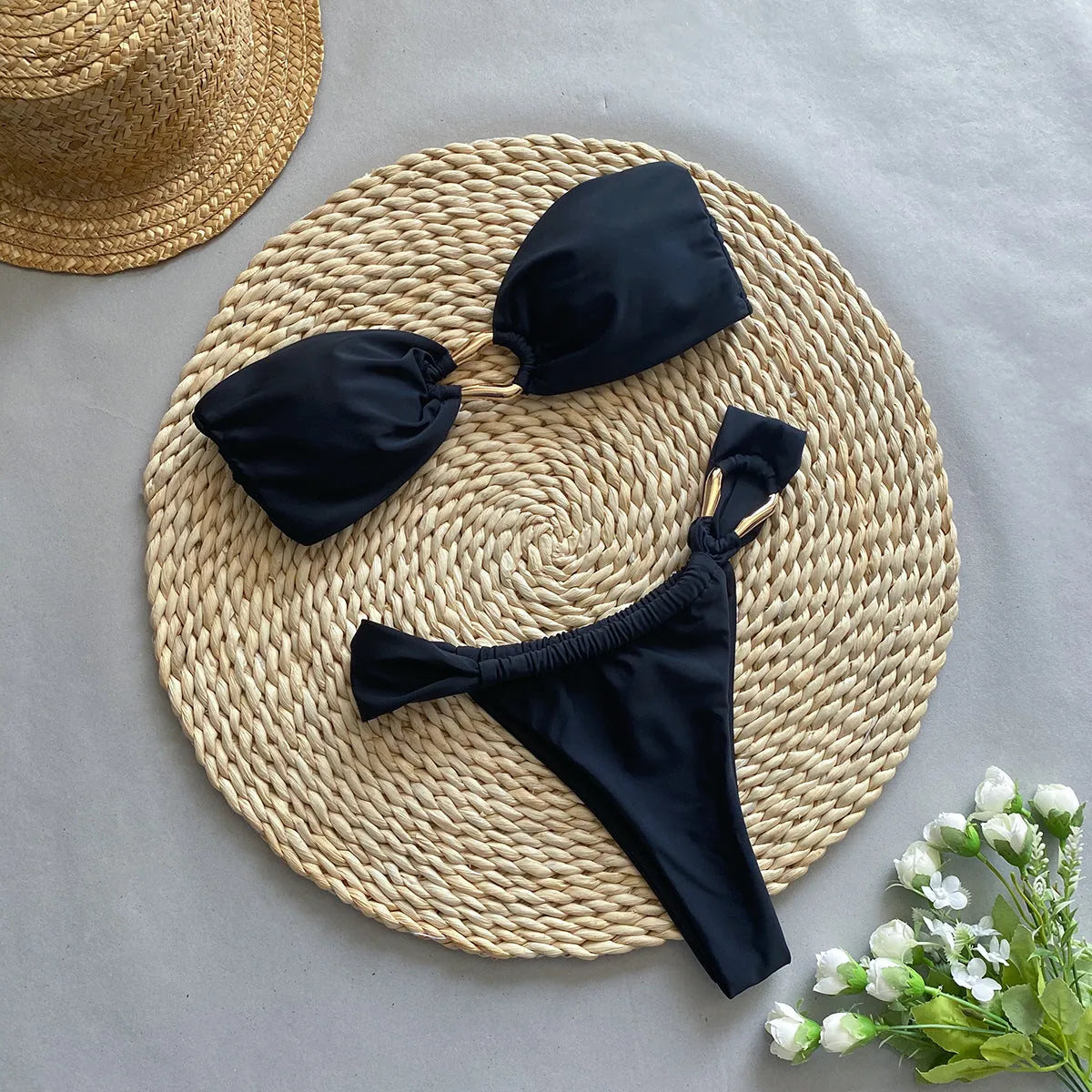 Women's low waist black bikini swimsuit with split front design for swimming and sports