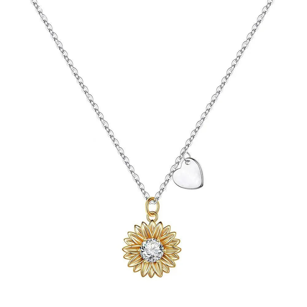 Women's adjustable sterling silver sunflower necklace with daisy petal design on a cross chain.